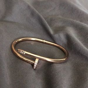 Rose gold nail bracelet with rhinestones
